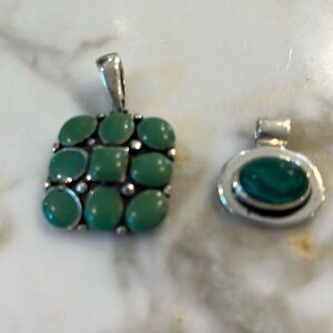 Green stone and silver pendants